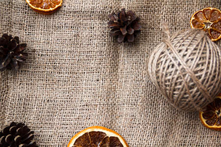 Background for a card, cloth, oranges and Christmas. Natural, eco-friendly.
