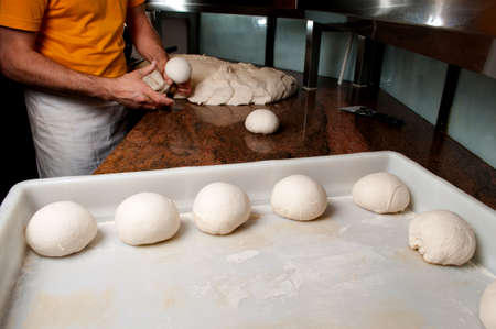 Chef prepare the dough for pizza