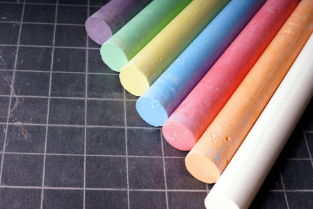 Blackboard and Coloured Chalksの写真素材