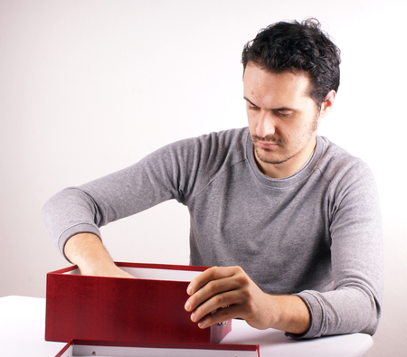 Man with red boxの写真素材