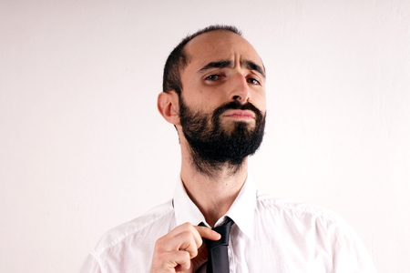 Man doing his tieの写真素材