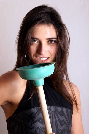 Lady with plungersの写真素材