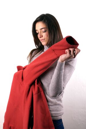 Woman with red coatの写真素材