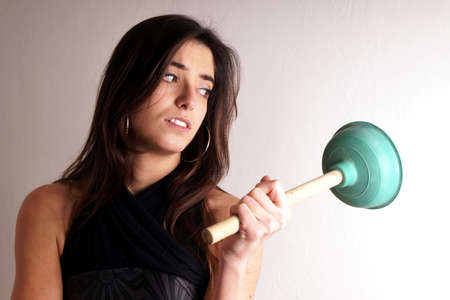 Lady with plungersの写真素材