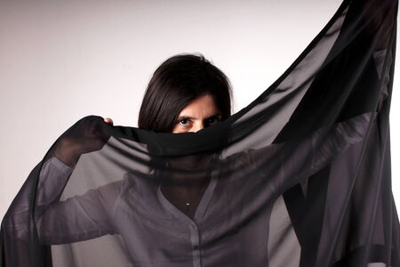 Woman with black trasparent scarf