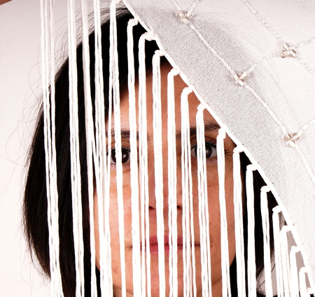 Woman with white scarfの写真素材