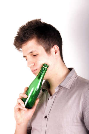 Boy with green bottleの写真素材