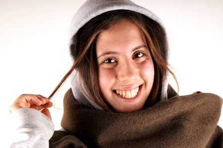 Girl with sweatshirt and scarfの写真素材