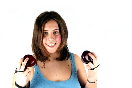 Girl playing castanetsの写真素材