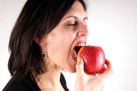 Woman with appleの写真素材
