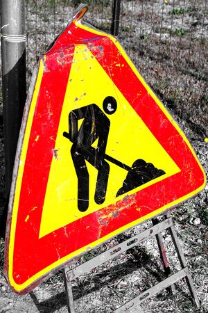 Close up of a man at work street signalの写真素材