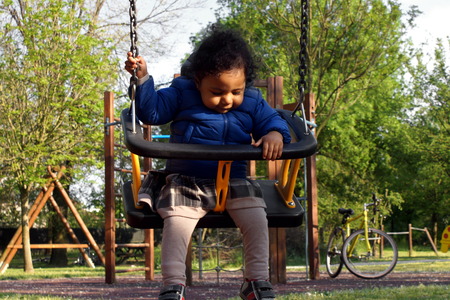 Detail of playing children in a park