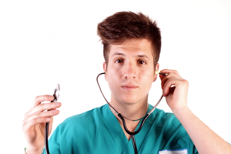 Studio shot of a young man with medical clothesの写真素材