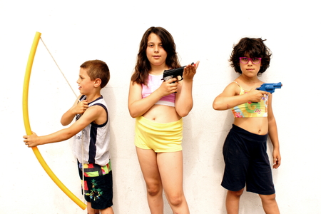 Outdoor shoot detail of funny playing childrenの写真素材