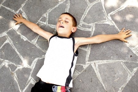 Outdoor shoot detail of funny playing childrenの写真素材