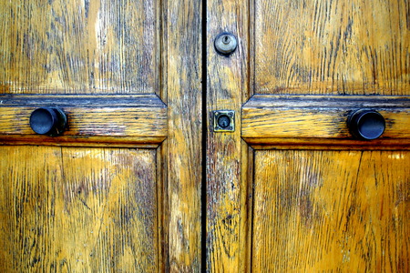 Detail of an old italian wood doorの写真素材
