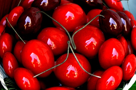 Close up of a ceramic cherries groupの写真素材