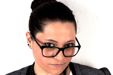 Elegant lady with glasses on white backgroundの写真素材