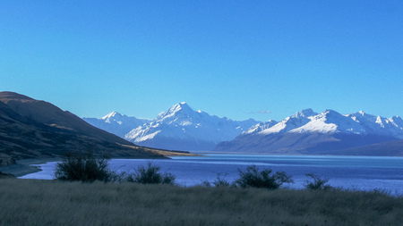 a shot of mt cook and lake pukaki at dusk in new zealand
