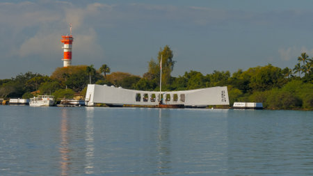 PEARL HARBOR, UNITED STATES OF AMERICA - JANUARY 12 2015: early morning reflections of the arizona memorial at pearl harbor, hawaiiのeditorial素材