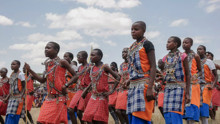 MASAI MARA, KENYA- 26, AUGUST, 2016: group of maasai boys dancing at koiyaki guiding school graduation in kenyaのeditorial素材