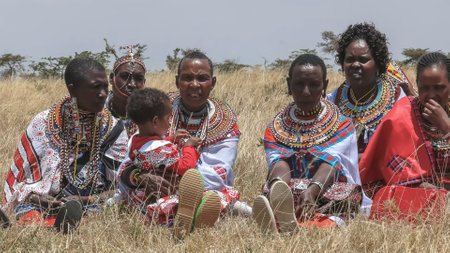 MASAI MARA, KENYA- SEPTEMBER, 26, 2016: maasai women at koiyaki guiding school graduation day in kenyaのeditorial素材