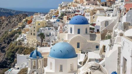 close up of the three blue domes at oia, santoriniの写真素材