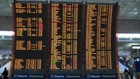 flight departure board charles degaulle airport, parisのeditorial素材