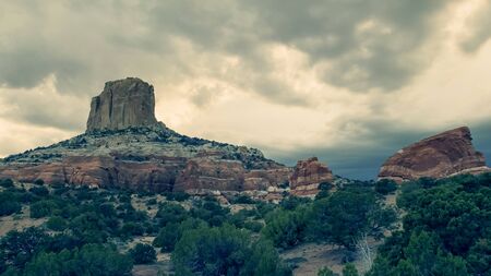 a butte and storm clouds near page, arizonaの写真素材