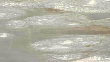 fountain paint pot mud pool in yellowstone