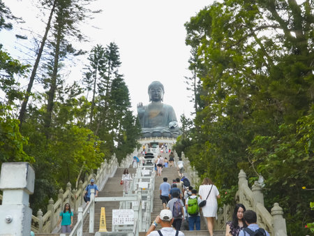 HONG KONG, CHINA- SEPTEMBER, 30, 2017: visitors climbing the steps to tan tian buddhaのeditorial素材