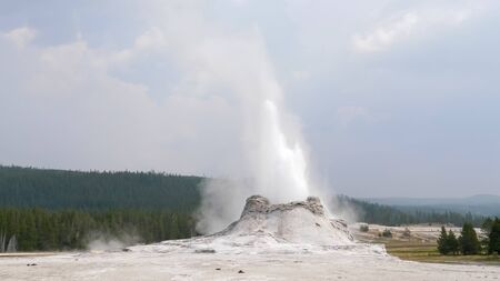 castle geyser erupting in yellowstone natl parkの写真素材