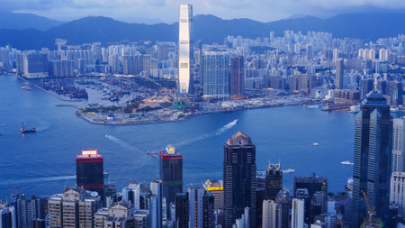 HONG KONG, CHINA- OCTOBER, 2, 2017: a close up shot at dusk of victoria harbour and hong kong island...