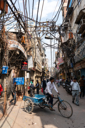 DELHI, INDIA - MARCH 11, 2019: a lane in the chandni chowk market district of old delhiのeditorial素材