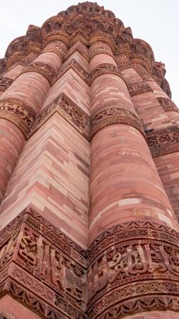 low angle view of qutub minar tower in delhi