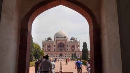 DELHI, INDIA - MARCH 12, 2019: humayuns tomb framed by entrance arch in delhiのeditorial素材
