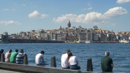 ISTANBUL, TURKEY - MAY, 23, 2019: people enjoying some leisure time on the waterfront of istanbulのeditorial素材