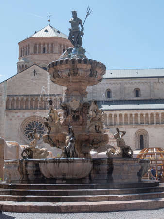 TRENTO, ITALY - JUNE, 1, 2019: fountain of neptune and trento cathedralのeditorial素材