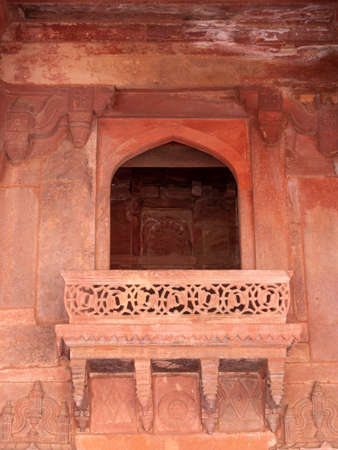 FATEPHUR SIKRI, INDIA- MARCH, 27, 2019: window and balcony at the front of an ancient indian palaceのeditorial素材