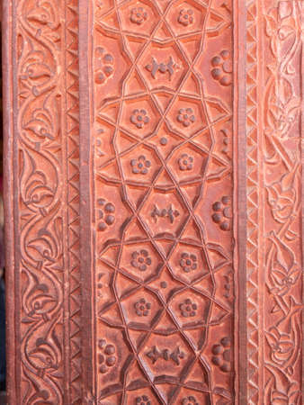 FATEPHUR SIKRI, INDIA- MARCH, 27, 2019: a floral design on the wall of an ancient mughal palaceのeditorial素材