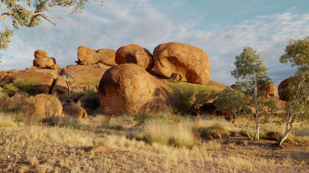 sunset close up of the devils marbles rocksの写真素材