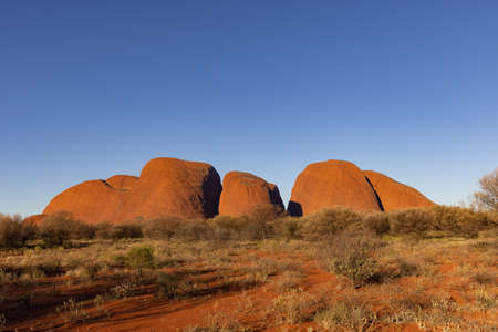 YULARA, AUSTRALIA - JUNE 6 2021: early sunset shot of the kata tjuta domes in uluru-kata tjuta national parkのeditorial素材