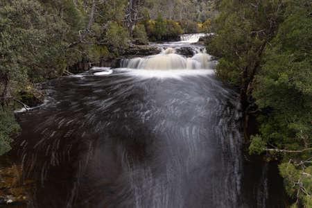 long exposure shot of pencil pine cascade at cradle mountain national parkの写真素材