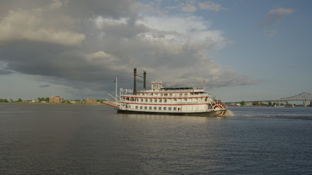 sunset shot of a paddle steamer on the mississippi riverのeditorial素材