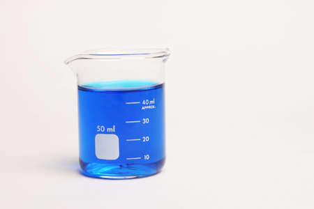 Beaker with blue liquid insideの写真素材