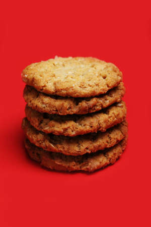 Stack of Cookies on a red backgroundの写真素材