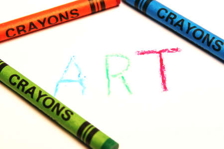 Colored crayons with the word artの写真素材