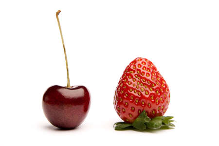 Perfect cherry and strawberry on a white backgroundの写真素材