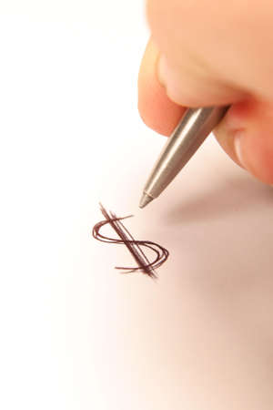 Hand writing dollar sign on paperの写真素材