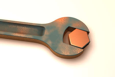 Rusty spanner turning a boltの写真素材